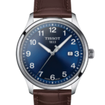Tissot Gent XL Classic Herrklocka Quartz 42 mm – Blå Urtavla med Silverfärgad Boett och Brunt Läderarmband